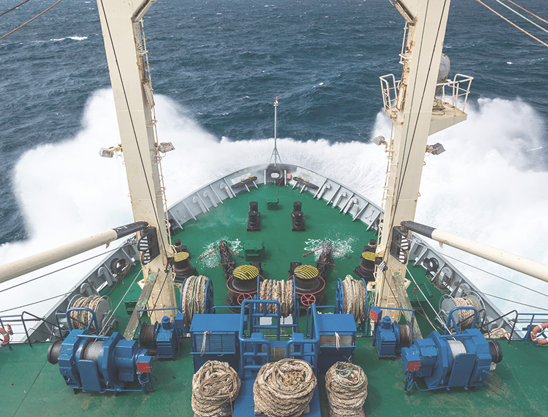 frontend of a vessel, breaching through waves